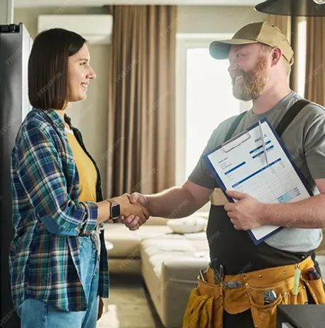 Customer and technician shake hands